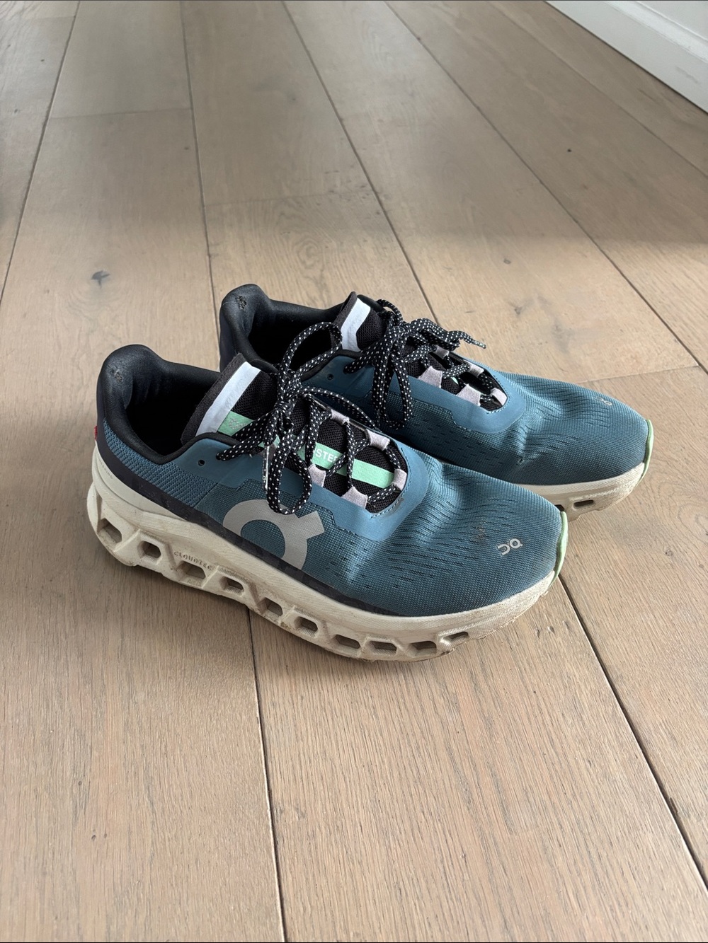 On Cloud cloud monster running shoes.